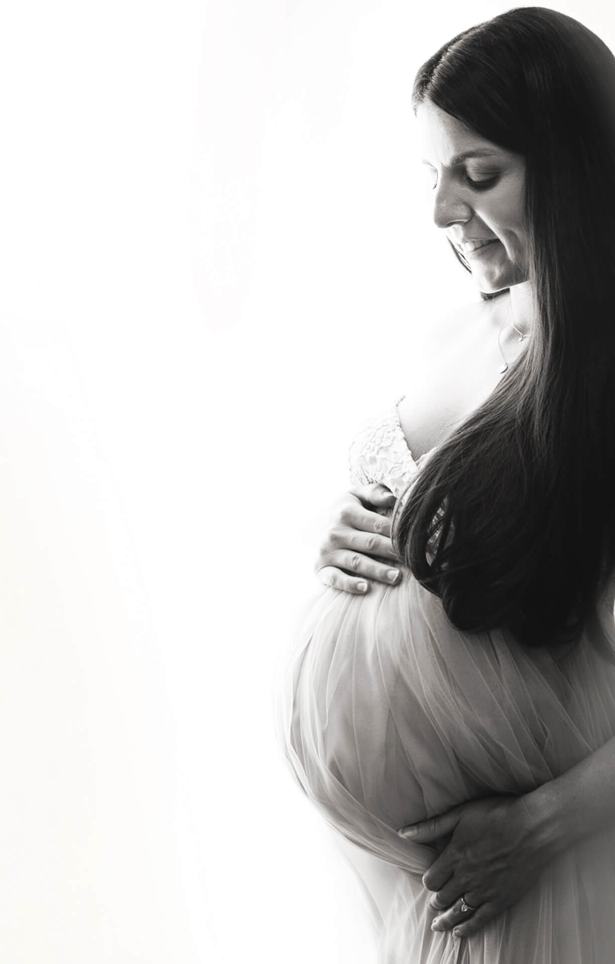 Photo of a pregnant lady black and white image showing her bump